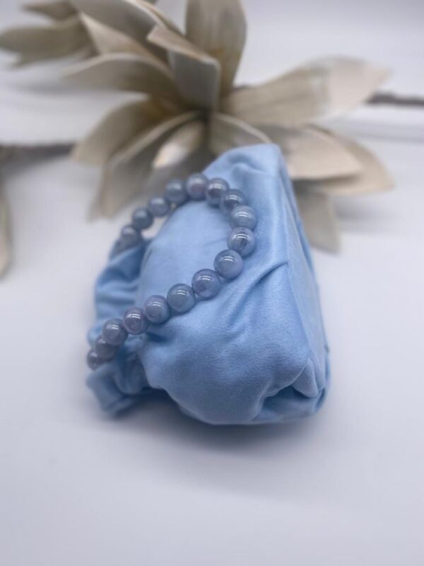 Bolso celeste con asa de perlas - Imagen 3